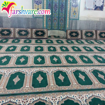نمونه‌ی بافته شده‌ی فرش سجاده ای محرابی مسجد طرح رضوان سبز